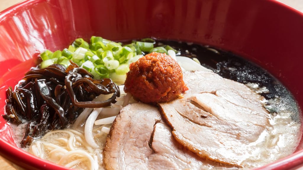 A bowl filled with meat and vegetables