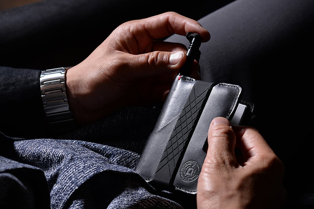 A close up of a hand holding a cellphone