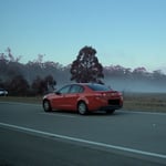 A car parked on the side of a road