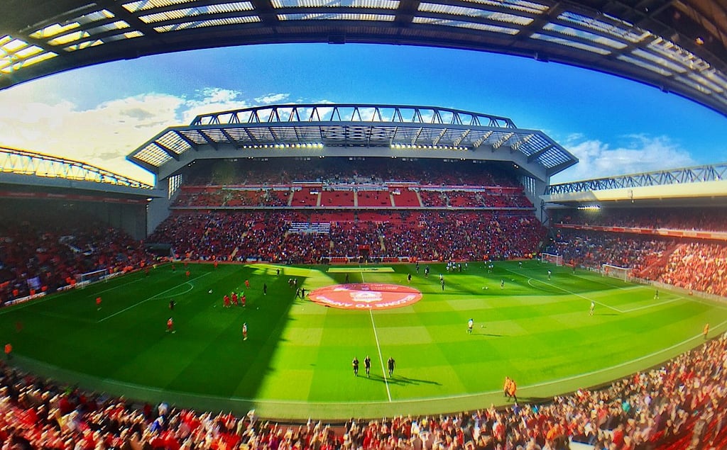 A large stadium with green grass