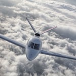 A large air plane on a cloudy day