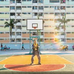 A person standing in front of a building