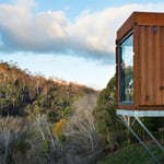 A house with trees in the background