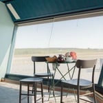 A chair sitting in front of a window