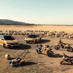 A motorcycle is parked on the beach