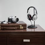 A desk with a book shelf