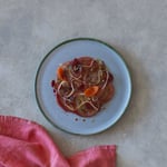 A bowl of food on a plate