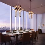 A dining room table in front of a window