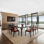 A living room filled with furniture and a table