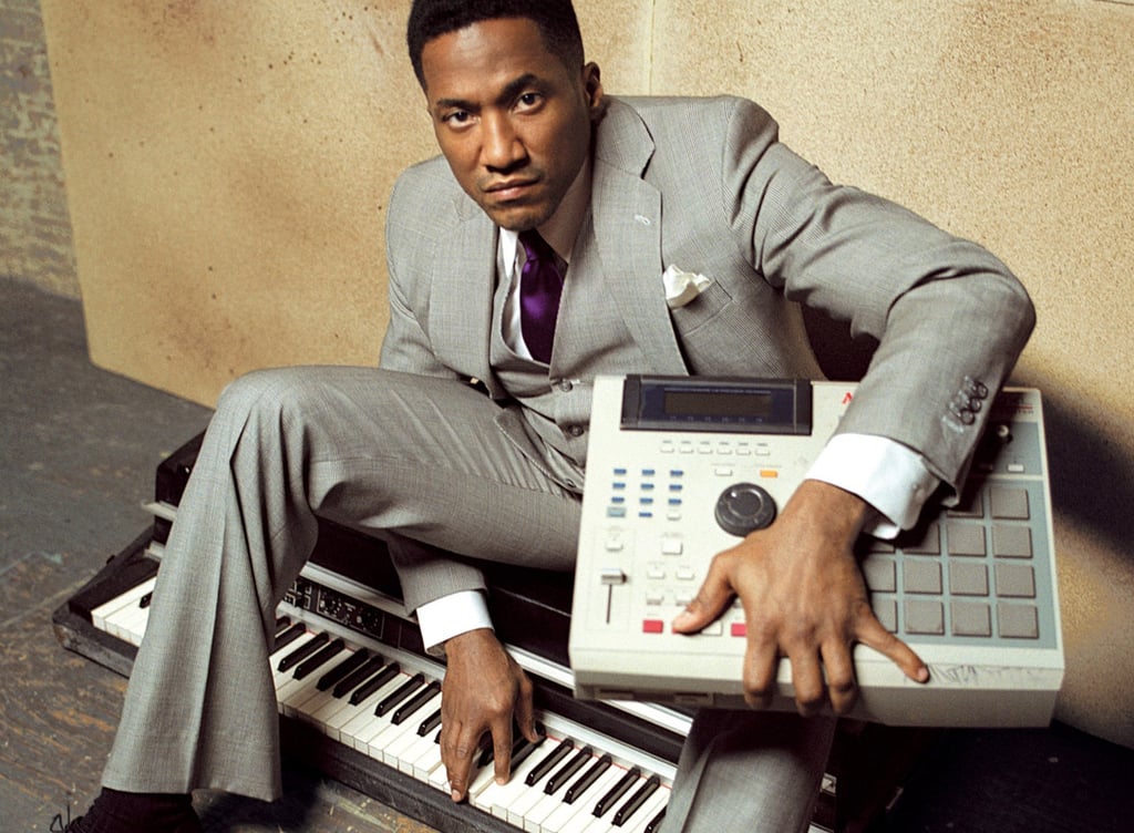 A man sitting in front of a keyboard