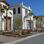 A close up of a street in front of a house