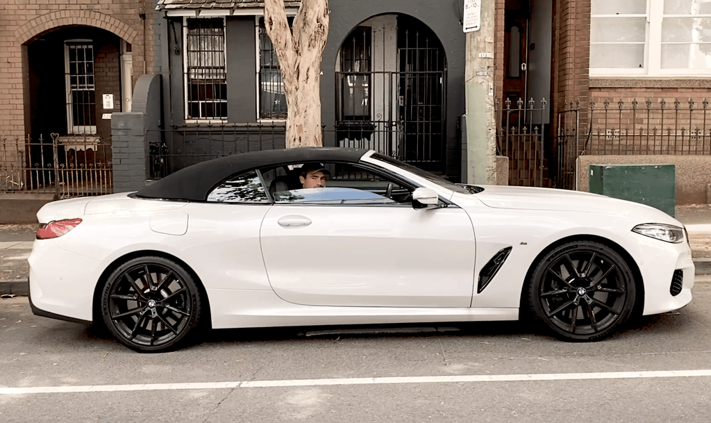 A car parked in front of a building