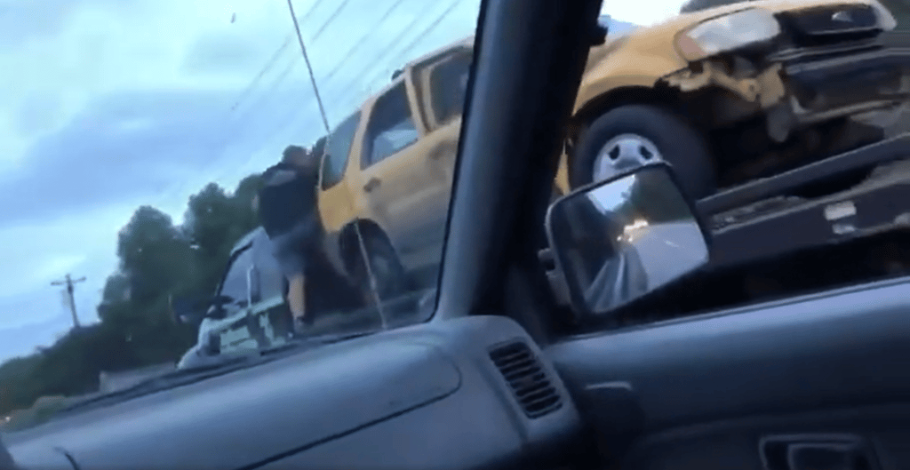 A person driving a car