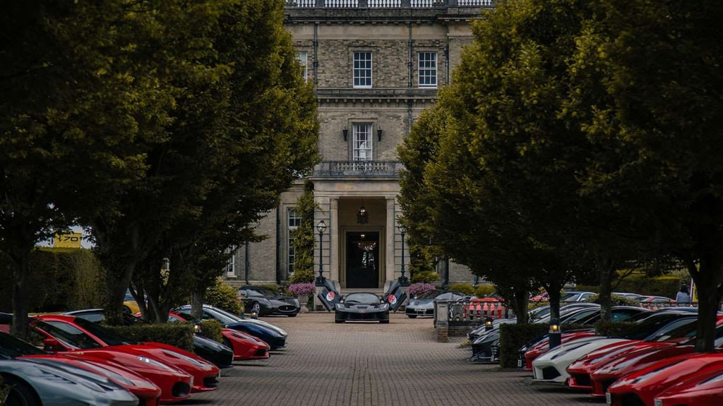 A car is lined up on the side of a road