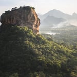 A view of a large mountain in the background