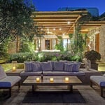 A living room filled with furniture and a bench