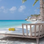 A chair sitting in front of a beach