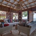 A living room filled with furniture and a large window