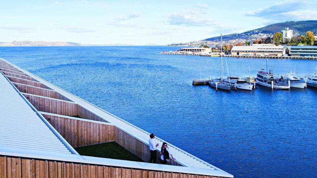 A boat is docked next to a body of water