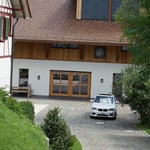 A car parked in front of a house