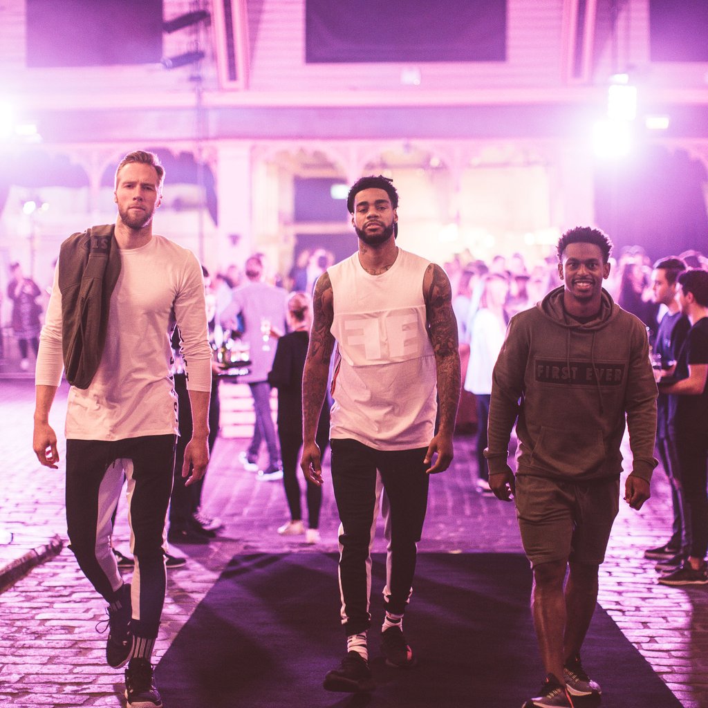 A group of people standing on a stage