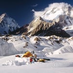 A man on a snow covered mountain