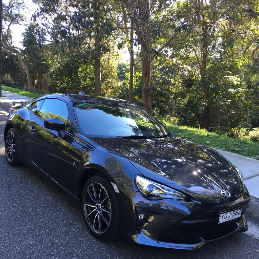 A car parked on the side of a road