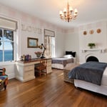 A living room filled with furniture and a large window