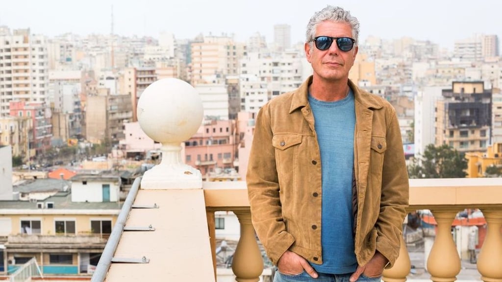 A man standing in front of a building