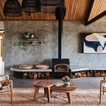 A living room filled with furniture and a fireplace