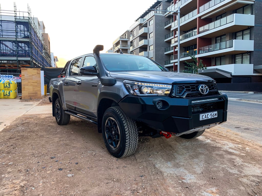 A car parked in front of a building