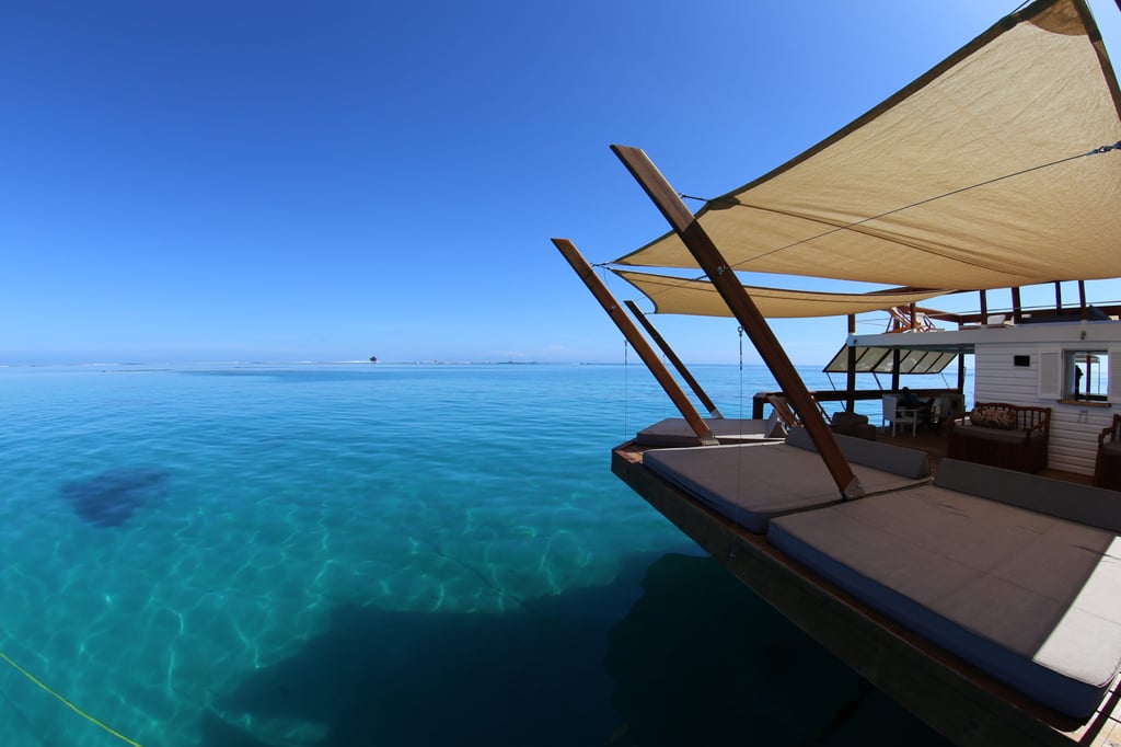 A wooden boat in a body of water