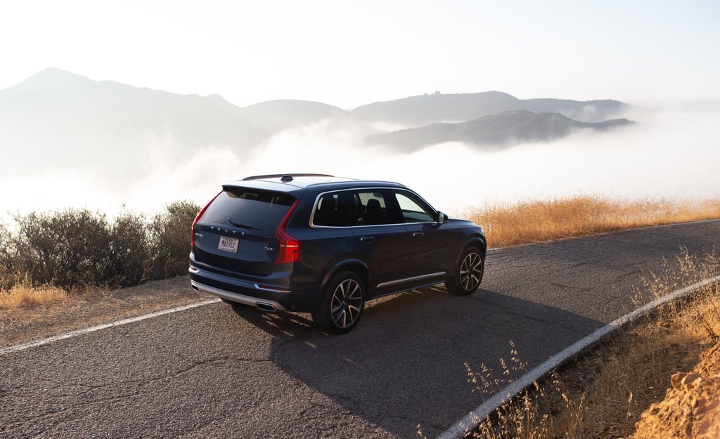 A car driving down a dirt road