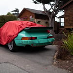 A car parked in front of a house