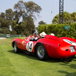 A car parked in a grassy field