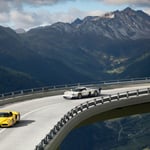 A highway with a mountain in the background