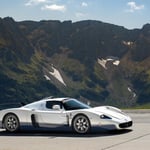 A car parked on the side of a mountain