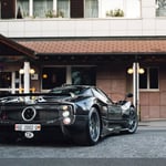 A car parked in front of a building