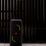 A green traffic light sitting on the side of the street