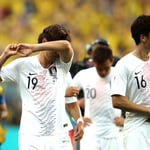 A group of men playing a game of football