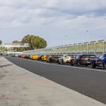 A group of parked cars in a parking lot