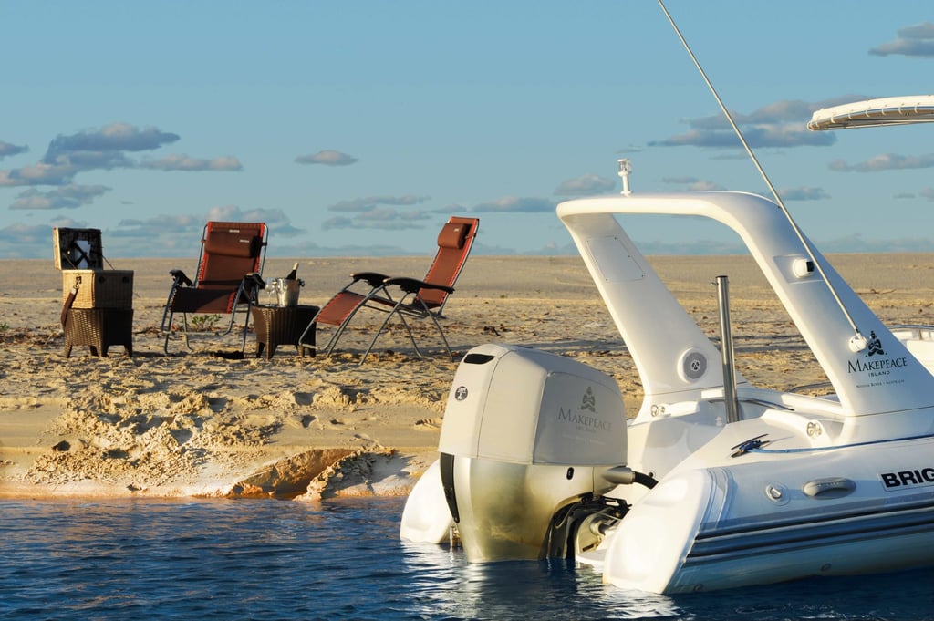 A close up of a boat next to a body of water