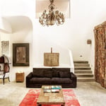 A living room filled with furniture and a fireplace