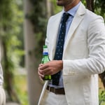 A man holding a wine glass