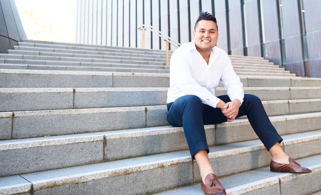 A person sitting on a bench