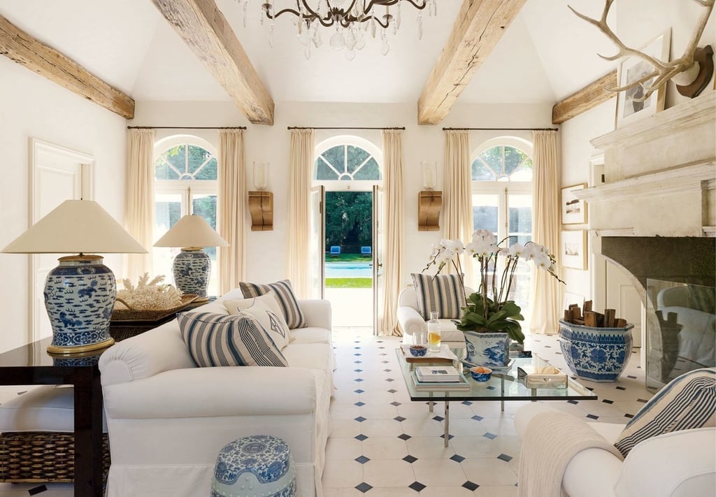 A living room filled with furniture and a fireplace