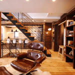 A living room filled with furniture and a fireplace