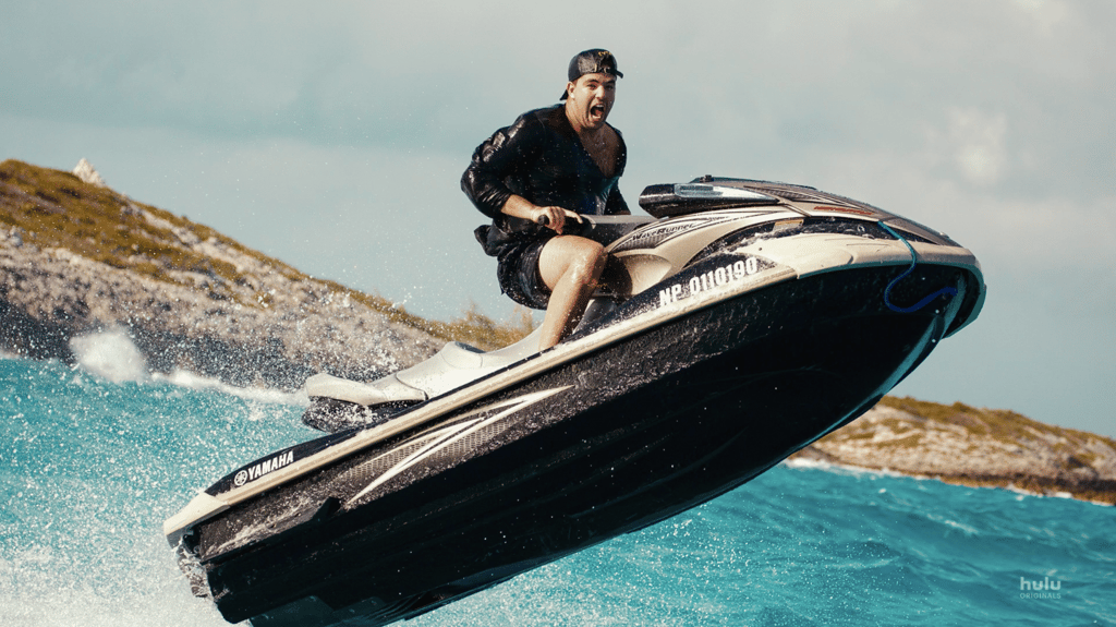 A person riding a surf board on a body of water