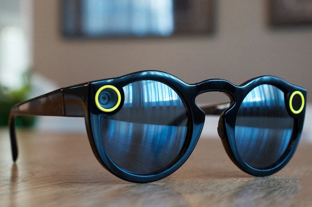 A close up of sunglasses on a table