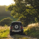 A car driving down a country road